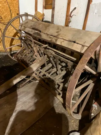 Vintage grain seeder. Massey-Harris. Working condition. Wooden wheels. Always kept inside.