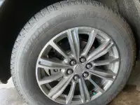 Michelin x-ice 235/65R18 winter tires on rim