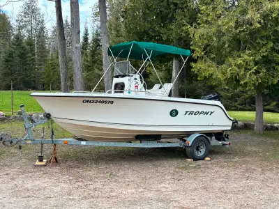 2003 19 1/2 foot trophy 1903cc anniversary edition center console with 125 mercury salt 2 stroke eng...