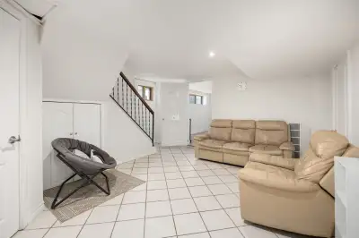 Private entrance, incredibly bright and spacious living space (not your typical basement!), fully-eq...