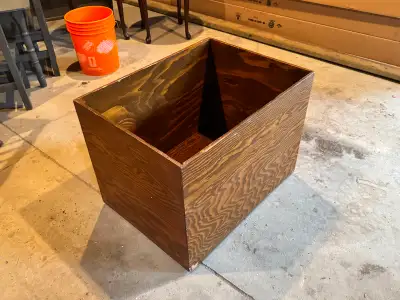Rolling Wooden Storage Chest / Toy Box Versatile wooden storage chest with a rich dark finish and bu...