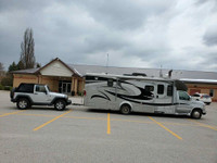 2010 Class B+ Winnebago Motorhome w/ optional Jeep Wrangler 