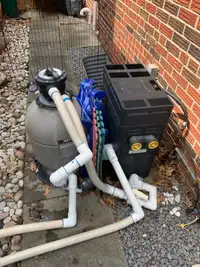 Pool heater and sand filter.
