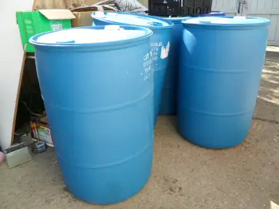 open top poly 35 gallon cost$45 resealable lid with metal ring very clean inside and out not as phot...