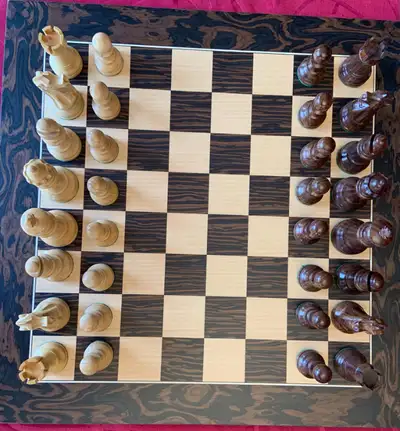 Brand New pieces and chess board. Laughing Knight chess set carved in the Staunton style from sheesh...