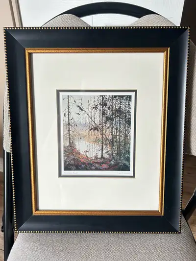 Framed "Northern River" print by Tom Thomson This is a framed print of "Northern River" by the artis...