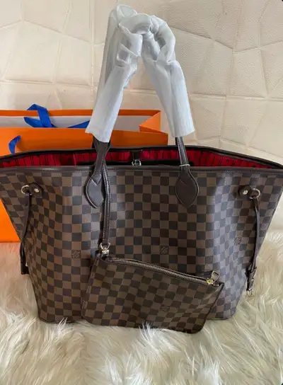 Brand new Louis Vuitton Neverfull MM in the pink pattern, a stylish and practical tote bag. The bag...