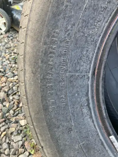 Good used tire complete on rim. 10 ply good tread left
