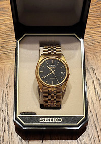 Antique SEIKO Men's Gold Watch and original case.