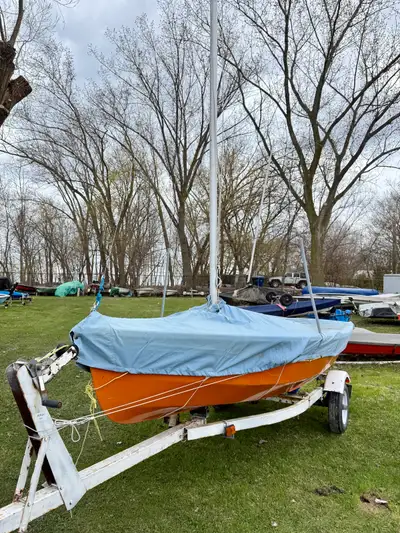 Well maintained CL14 Sailboat. In good condition, working order with many sails and a great trailer....