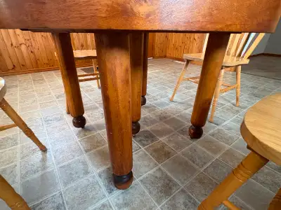 Refinished Antique Hardwood Round Table with 5 Legs. Table measures 42” round x 30” high.