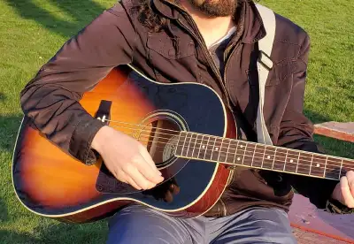 Seeking 2nd guitarist to form acoustic duo, View more