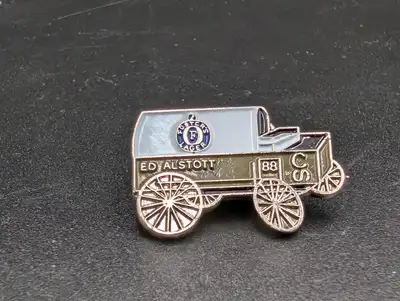 1988 Ed Alstott Fosters Lager Calgary Stampede Chuckwagon Pin, View more
