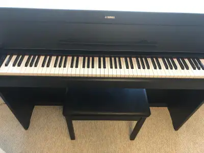 YAMAHA PIANO AND BENCH FOR SALE - NEW, View more