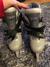 Girl’s size 12-1 adjustable CCM ice skates