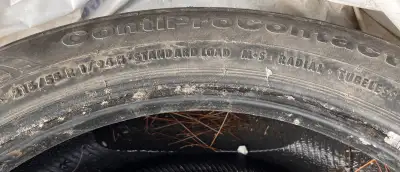 Offering a set of four used tires, size 215/55 R17 94H. These tires are Continental ContiProContact...