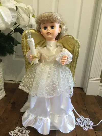 Make spirits bright with this beautiful animated angel with light and motion. She will fill your hom...