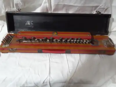 As pictured (appear to be upside down.) One fingerpad key needs reattachment (see picture). Includes...