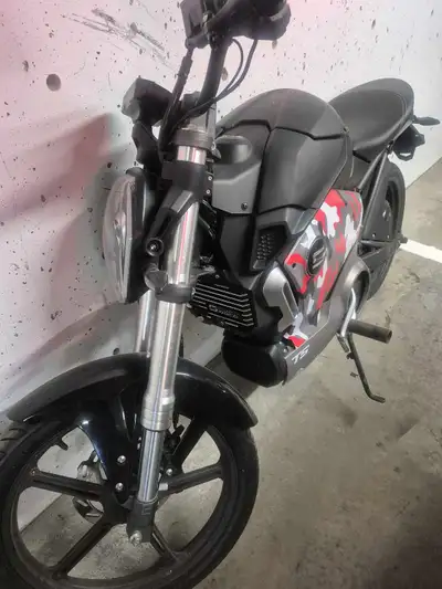 This pre-owned Super Soco TS electric motorcycle Missing handlebars ($60) It comes with brand new ba...