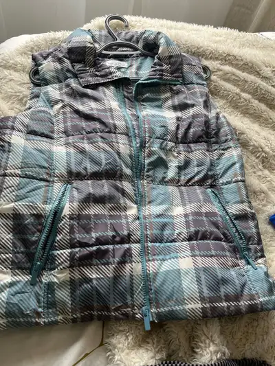 woman’s vest & sweater, View more