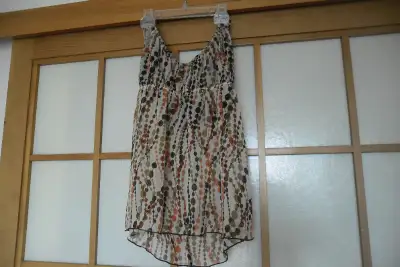 Cute halter neck top with light padding. Small size., View more