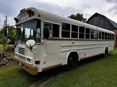 This bus has been registered as a motor home so no special license required. Cushions in photo not i...