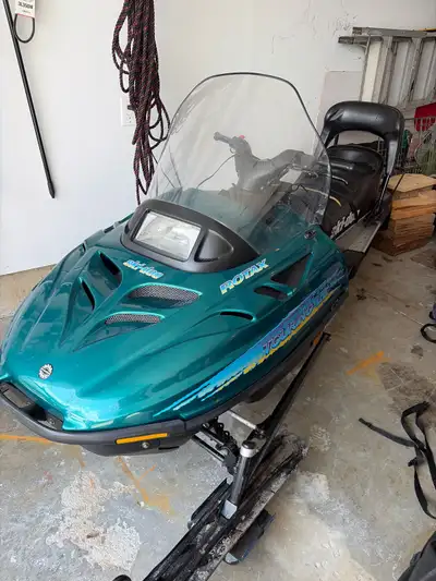 I'm selling my Ski-Doo Touring LE snowmobile, known for its reliability and comfortable ride, perfec...