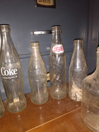 Vintage Coca-Cola and Pepsi bottles