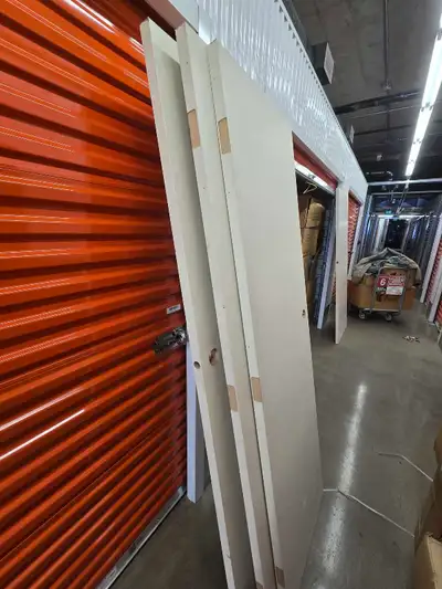 Two fire doors and multiple other doors , View more
