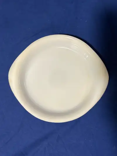 Vintage Glasbake Milk Glass 9.5” baking dish, #J517, with some signs of wear.