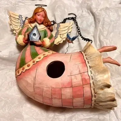 Would make a nice gift for the bird lover. Like new, Jim Shore pink angel hanging birdhouse with blu...