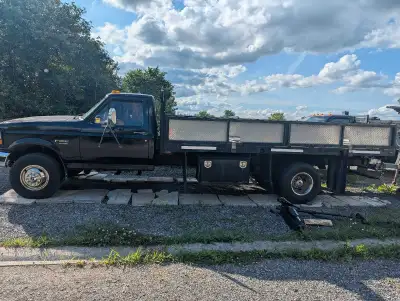 1996 7.3 diesel..has 294000km has a ramp for loading sleds bikes has dirt bikes holders.. has two 10...