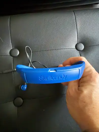 Listen up, active folks! I'm selling these blue Skullcandy sport headphones that are perfect for wor...