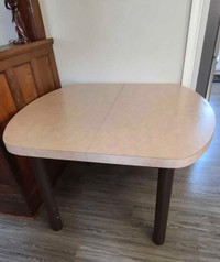 Solid wood and metal dining table