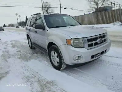 For sale 2011 Ford Escape Limited AWD with 188000km Has new battery, heated front seats, remote star...