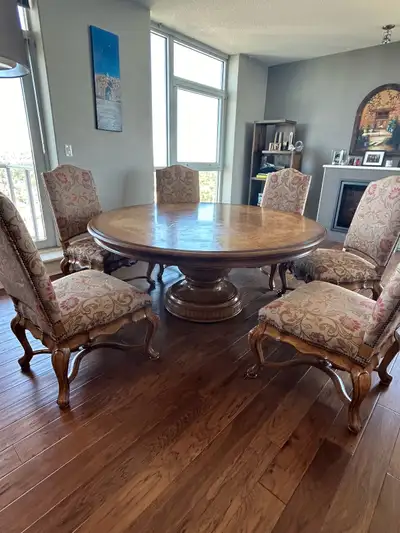 Purchased from USA in 2019 for $15,000 6ft Diameter solid, heavy, gorgeous Dining room table with 8...