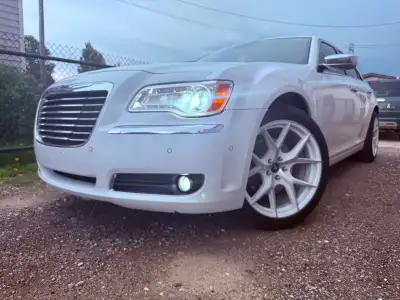 Looking to sell my 2014 Chrysler 300 C Hemi with all-wheel drive, featuring a powerful engine and al...