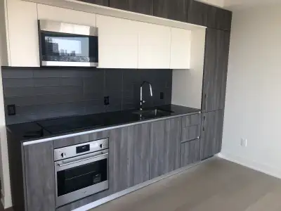 Brand new and never lived (Suite #801), this beautifully designed 1‑bedroom, 1‑bathroom corner suite...
