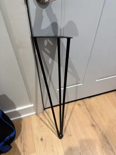 Elevate your DIY projects with these sleek, black metal hairpin legs, perfect for crafting custom ta...