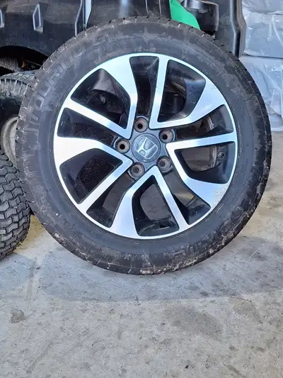 4 16" HONDA ALLOY RIMS FROM A CIVIC 4 205-55-R16 TIRES. LOTS OF WEAR LEFT.
