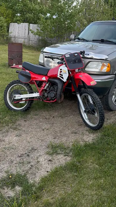 mint cr125r for sale i retro red it so a lot of stuff is aftermarket, i will accept trades of i like...