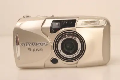 Has a winding problem. When film is inserted, camera does not automaticlly wind the film. There is a...