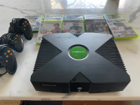 Xbox original with controllers and games