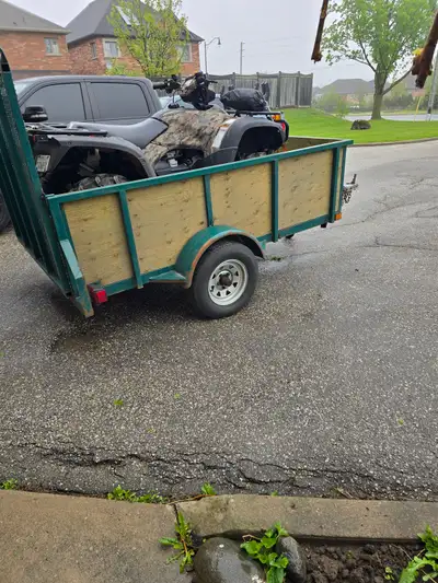 Well kept 5’x8’ trailer never left outside with brand new tires. The back talegate is easy to remove...