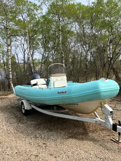 THIS IS A LOVELY LIGHT FAST RIGID HULL INFLATABLE RIB THAT IS VERY CLEAN WITH MANY EXTRAS --total we...