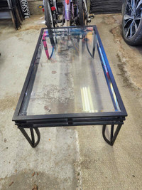 Glass top metal coffee table