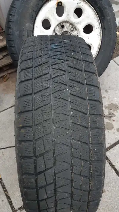 3 3 Bridgestone Blizzak winter tires truck tires off rim got rid of the room just have the tires now...