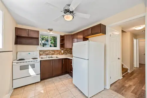 The comfort of a house, at the price of an apartment! Available August 1st, this garden-level, walk-...
