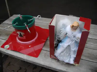 Christmas tree stand and topper, View more