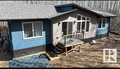 House for sale near Pigeon Lake. 1.64-acre wooded lot with no rear neighbors, located in a very peac...